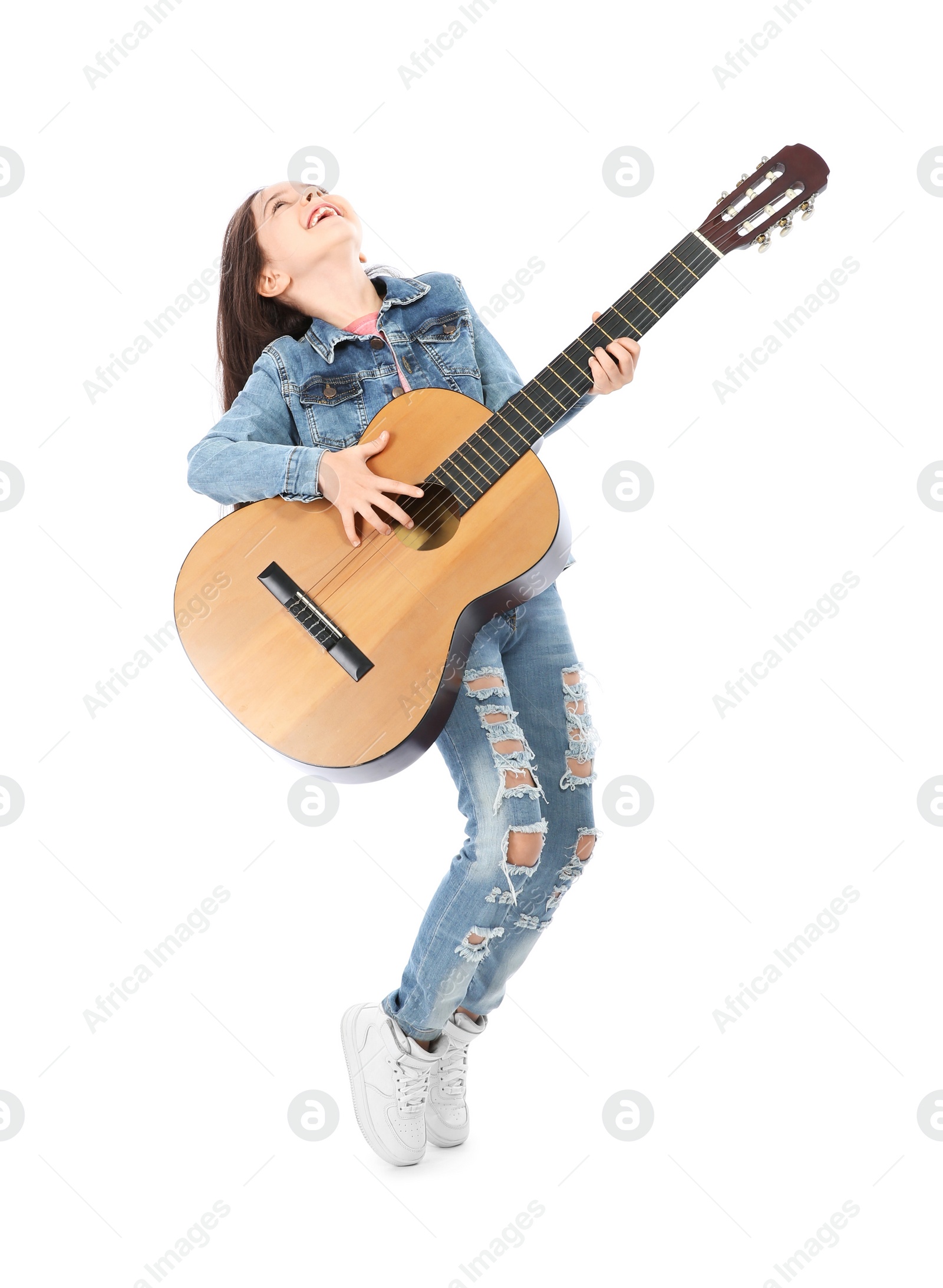 Photo of Emotional little girl playing guitar, isolated on white