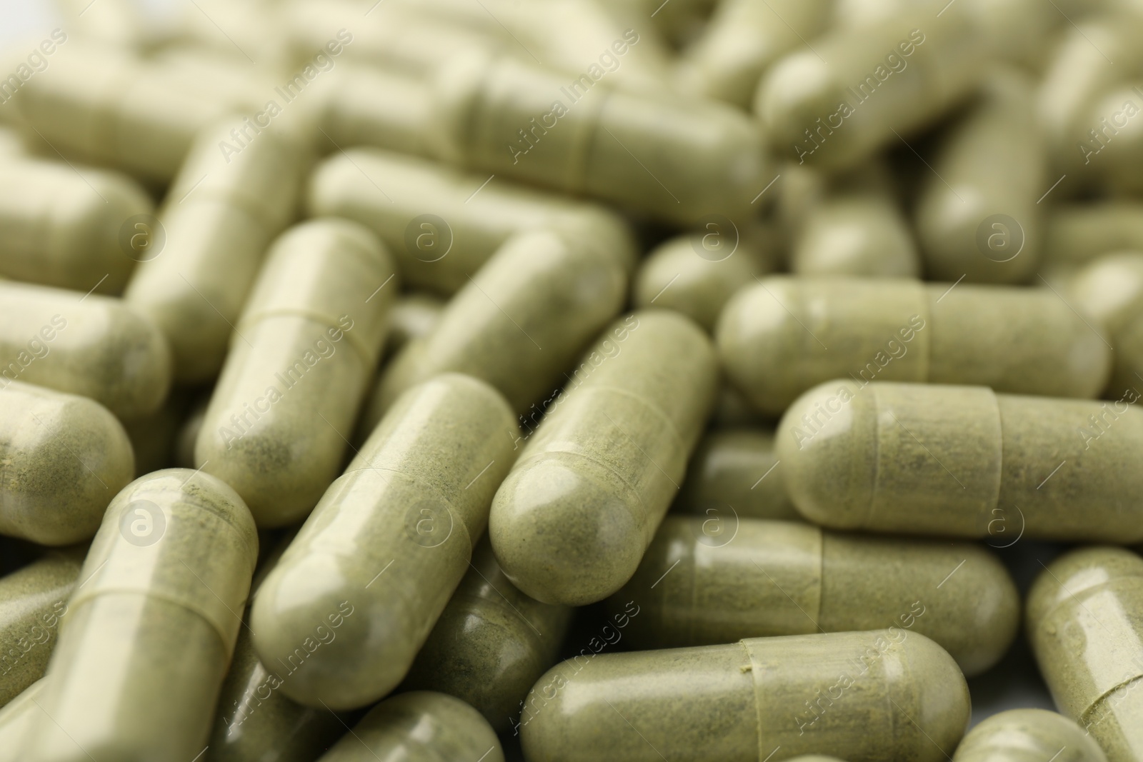 Photo of Pile of vitamin capsules, closeup. Health supplement