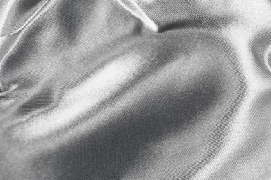 Photo of Texture of silver fabric as background, closeup