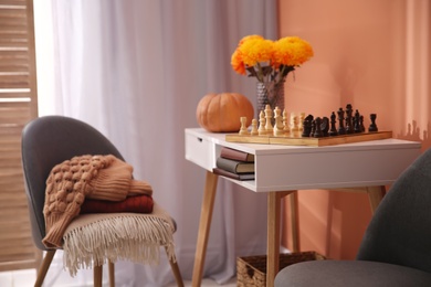 Photo of Cozy room interior inspired by autumn colors