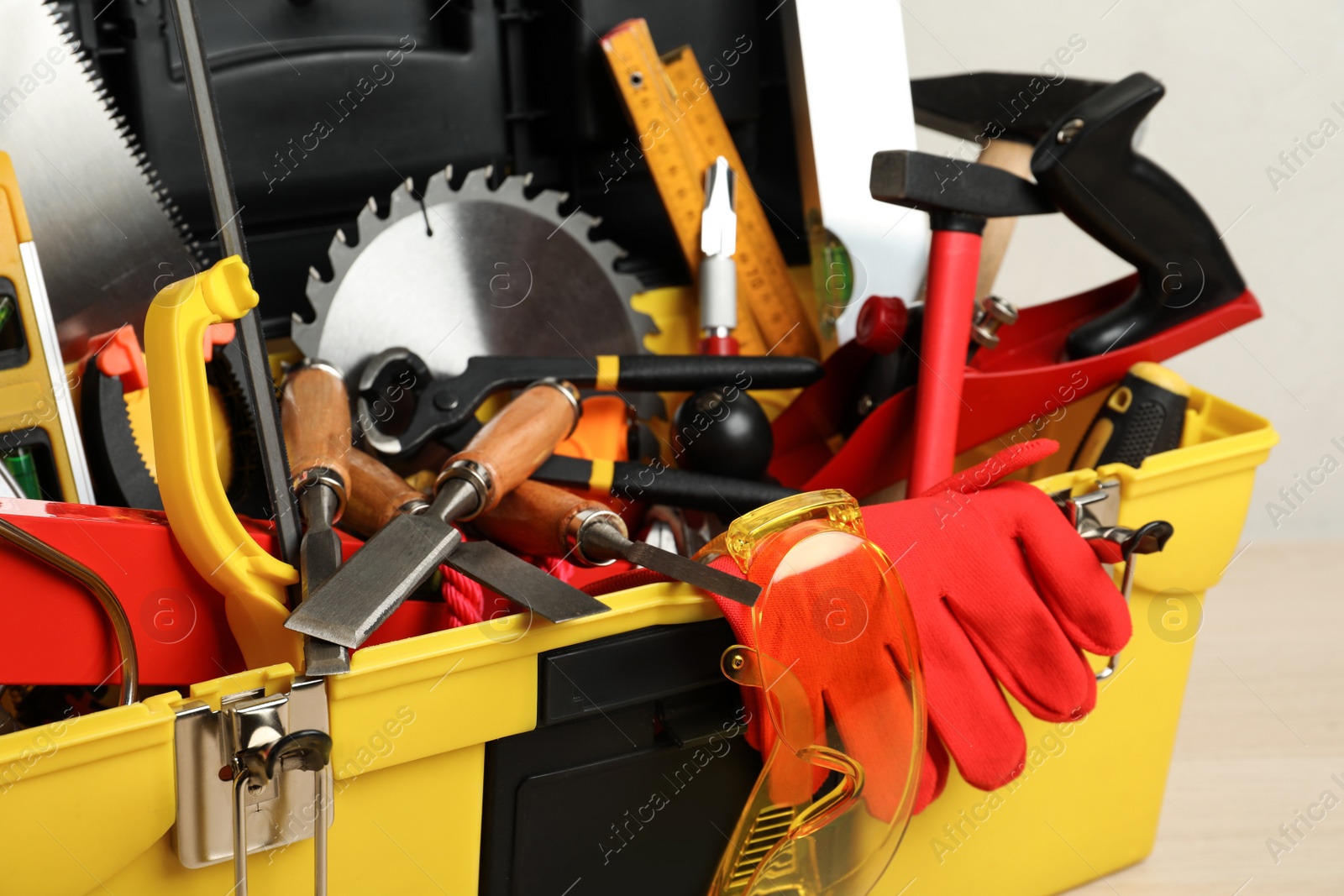 Photo of Box with different carpenter's tools, closeup view