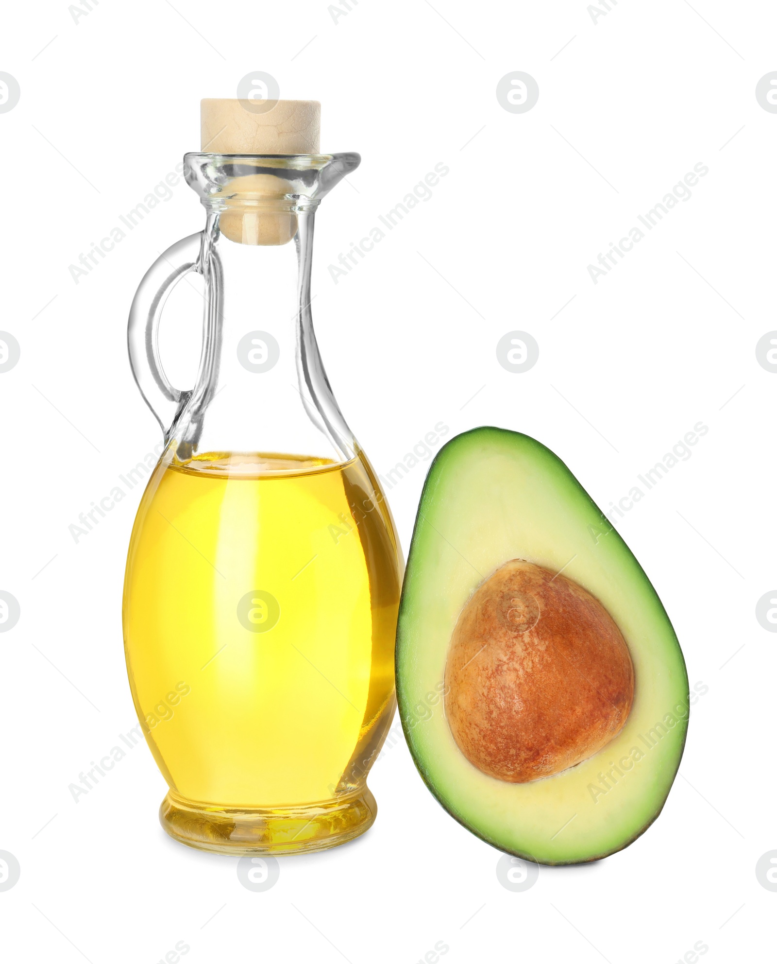 Photo of Cooking oil and half of fresh avocado isolated on white