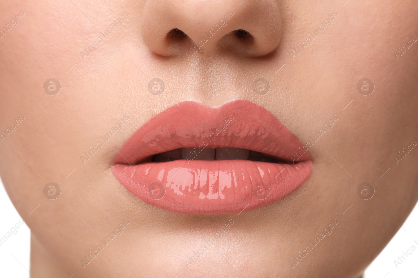 Photo of Woman wearing beautiful lip gloss, closeup view
