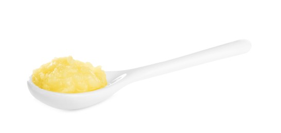 Spoon of Ghee butter isolated on white