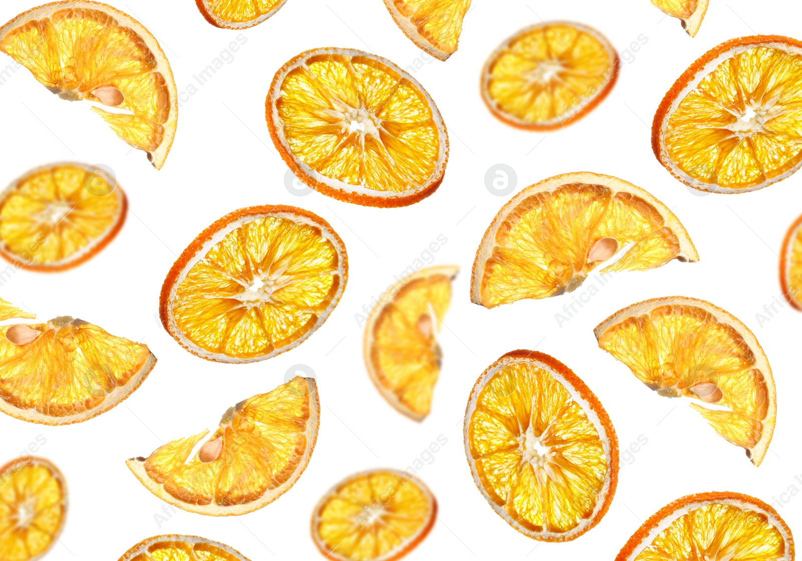 Image of Many dry orange slices falling on white background