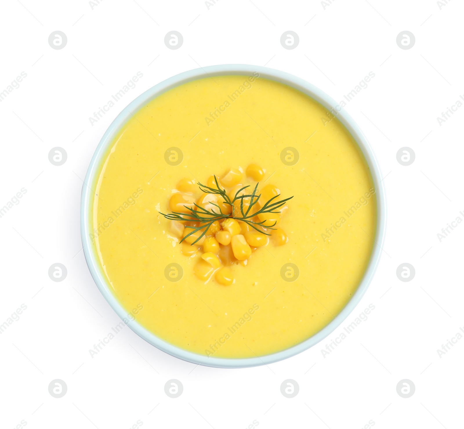 Photo of Delicious creamy corn soup isolated on white, top view