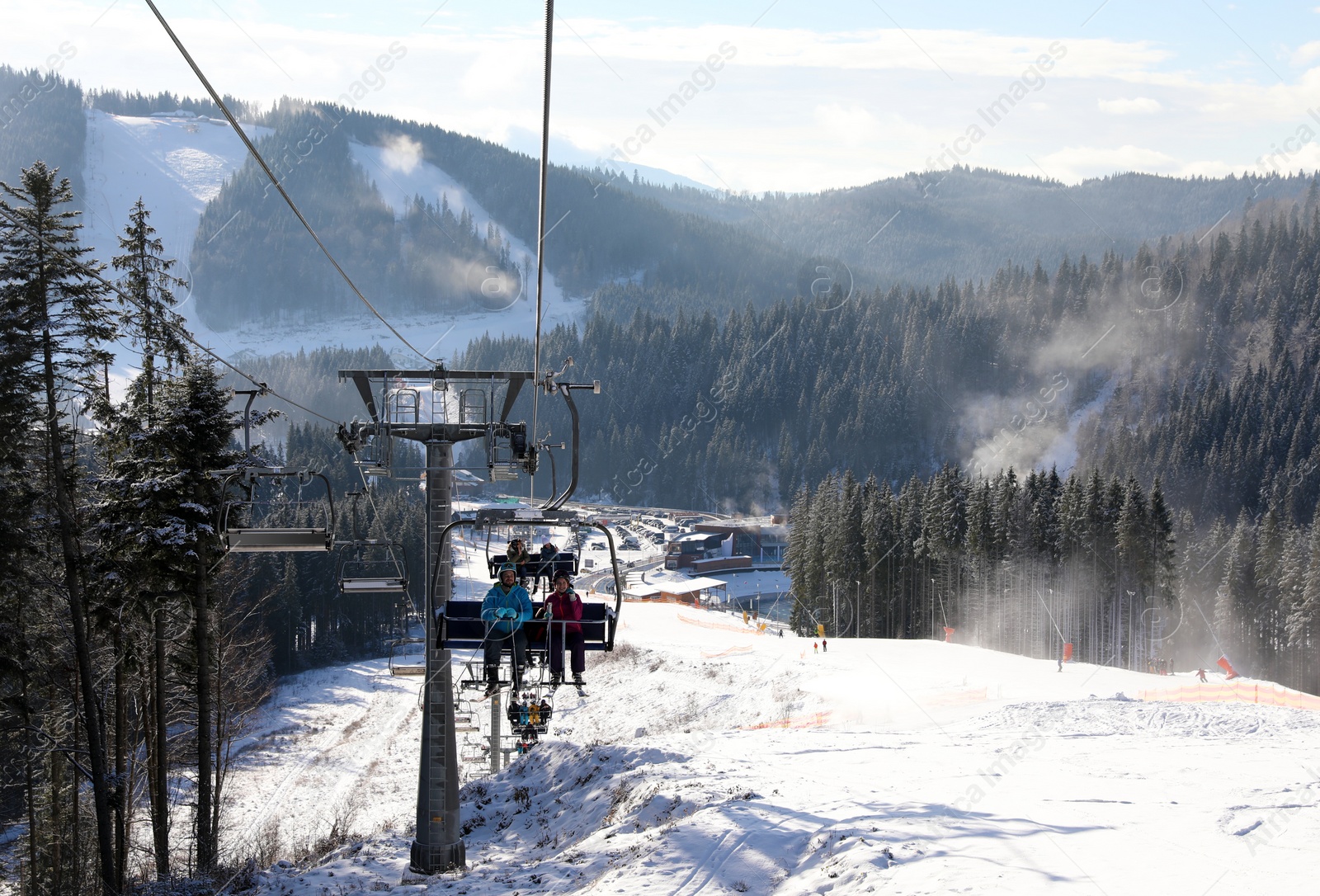 Photo of Beautiful mountain landscape with chairlift. Winter vacation