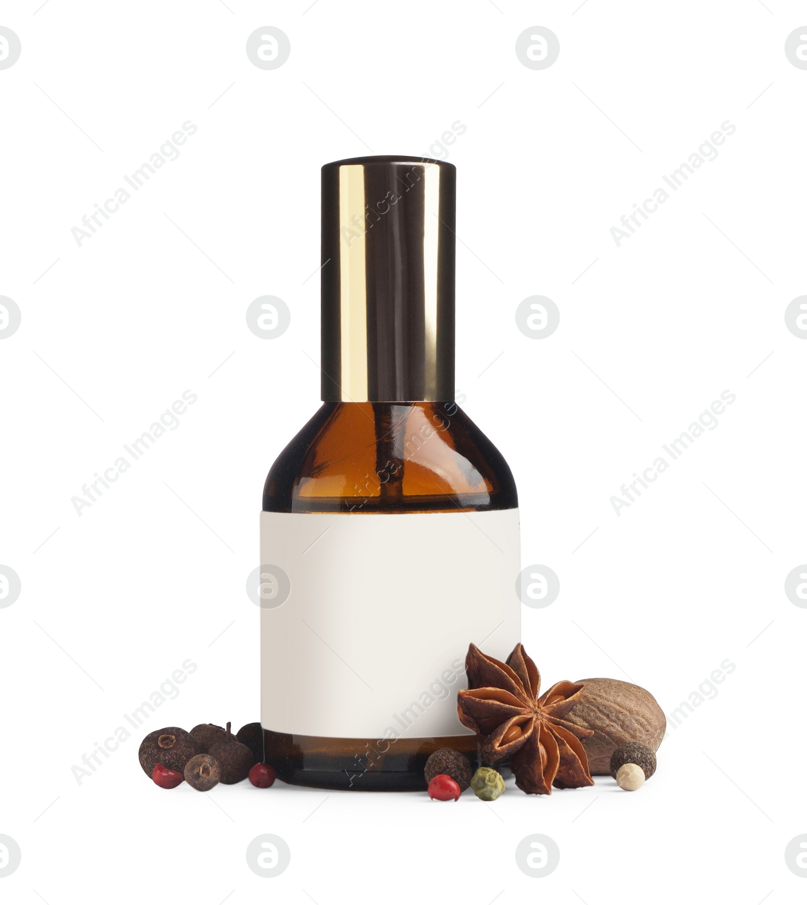 Photo of Bottle of perfume and different spices on white background