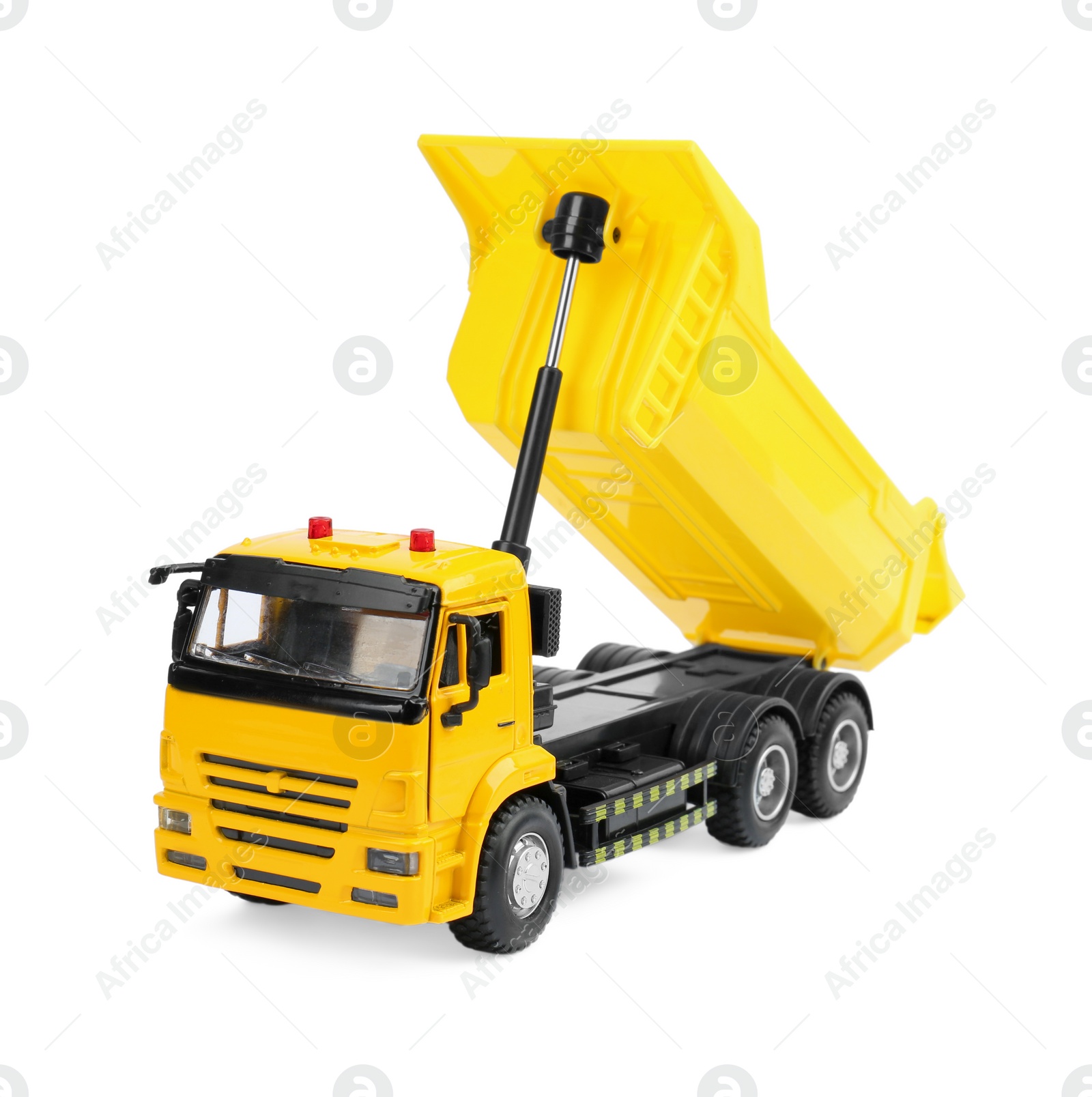 Photo of Yellow truck isolated on white. Children's toy