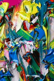 Photo of Abstract colorful acrylic paint as background, closeup view