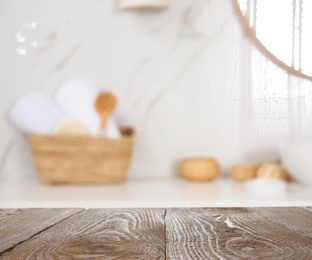 Image of Empty wooden table in bathroom. Space for text