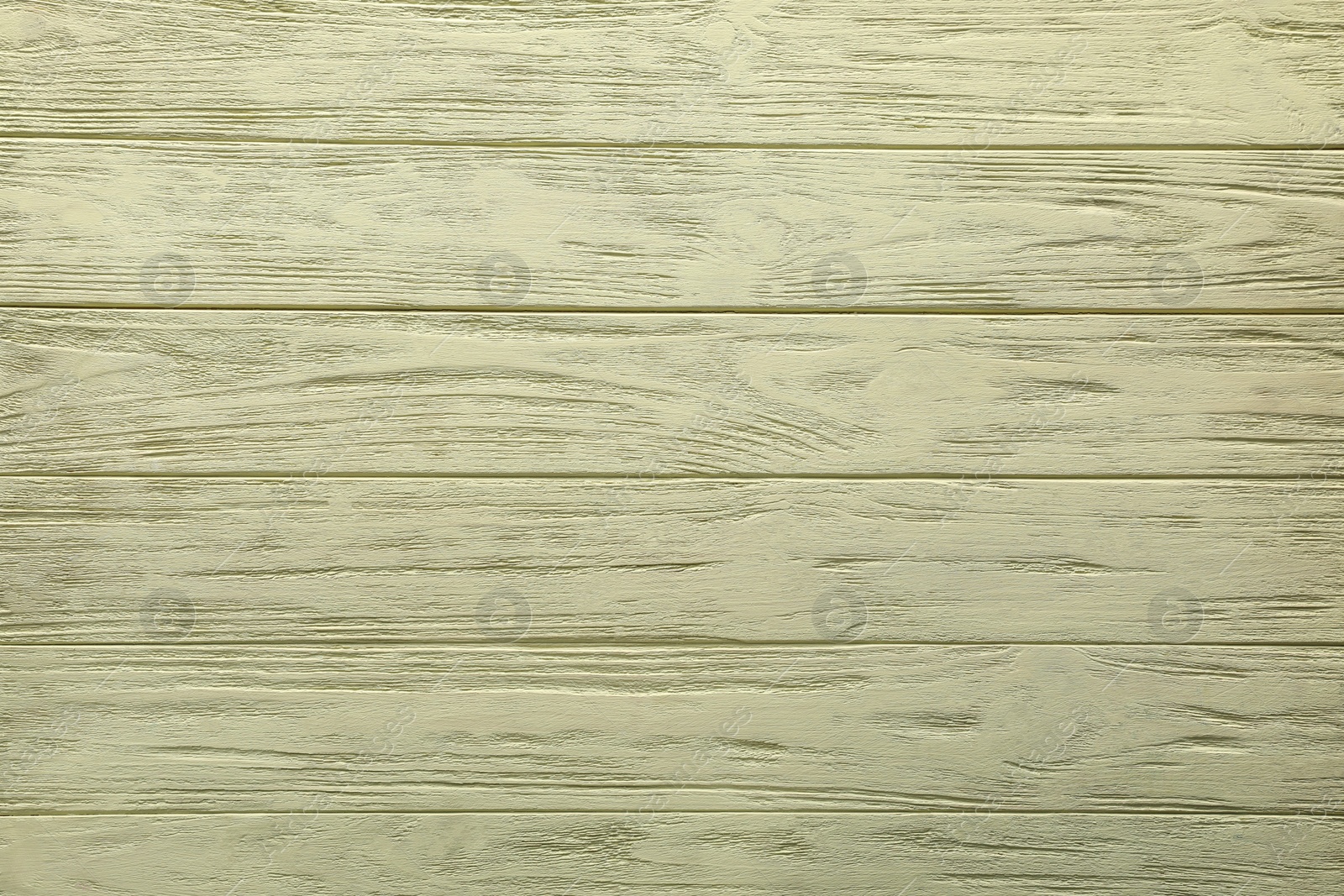 Photo of Texture of pale yellow wooden surface as background, top view