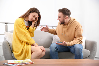 Couple having quarrel at home. Relationship problems