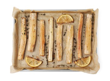 Photo of Baking tray with cooked salsify roots, lemon and thyme isolated on white, top view