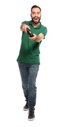 Photo of Emotional young man playing video games with controller isolated on white