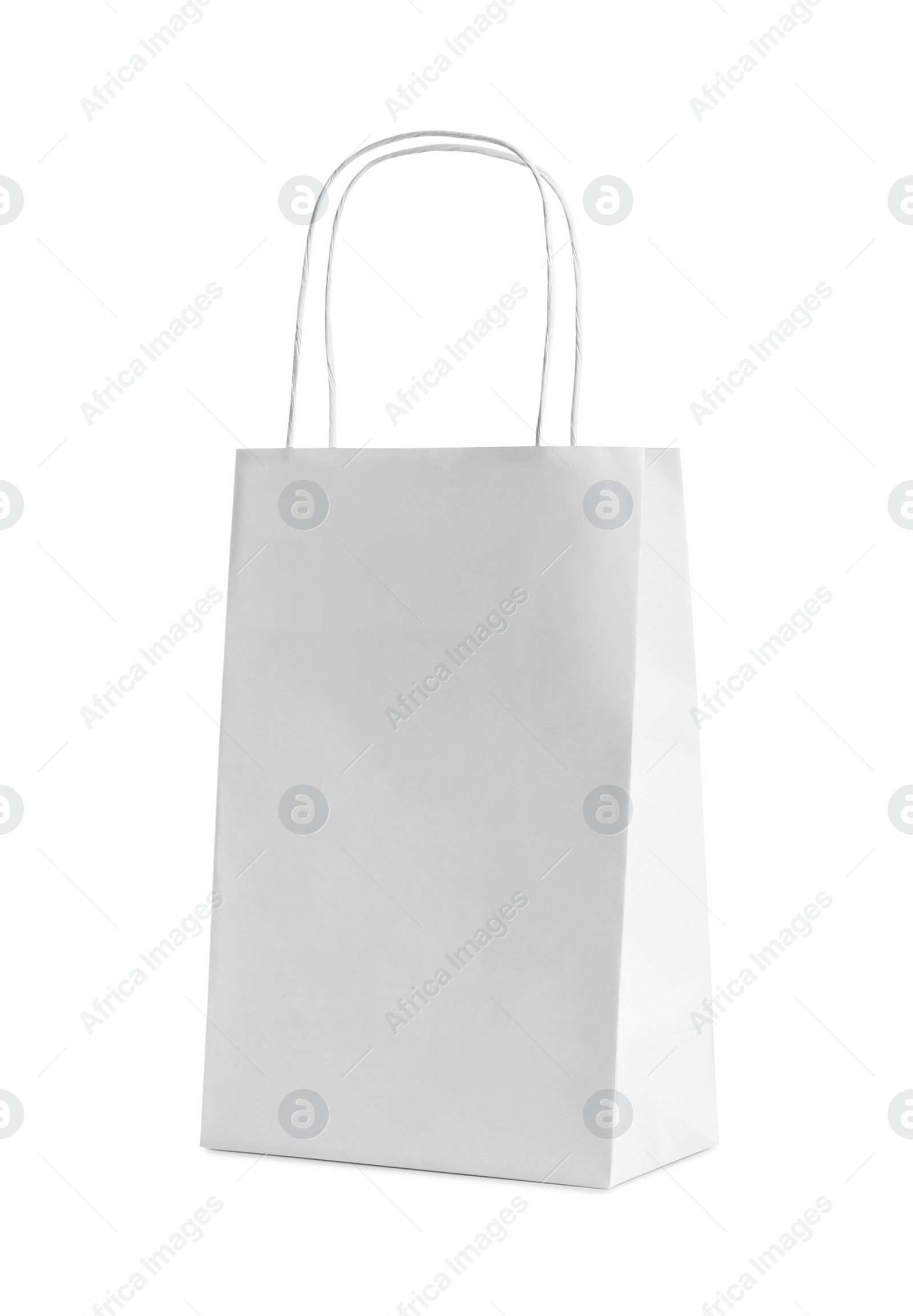 Photo of One paper bag isolated on white. Mockup for design