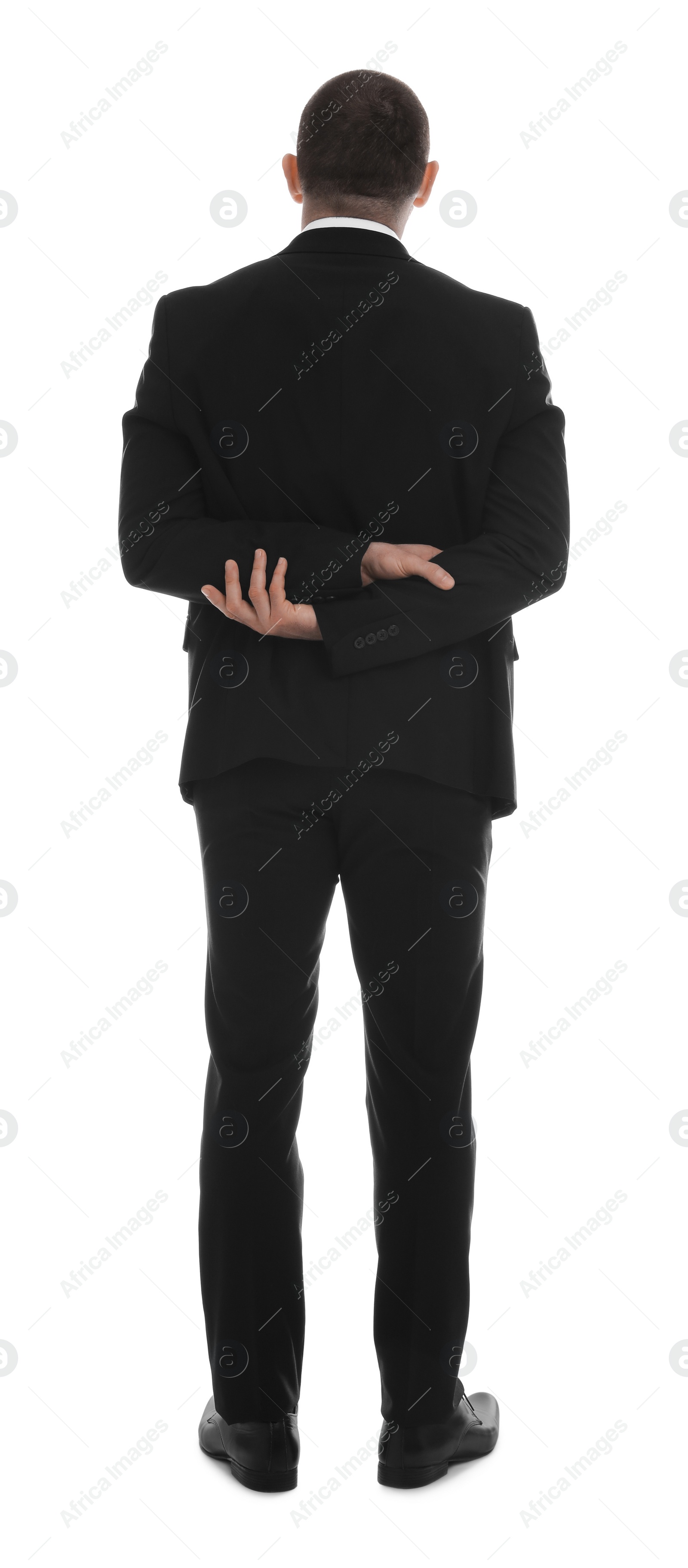 Photo of Businessman in suit on white background, back view