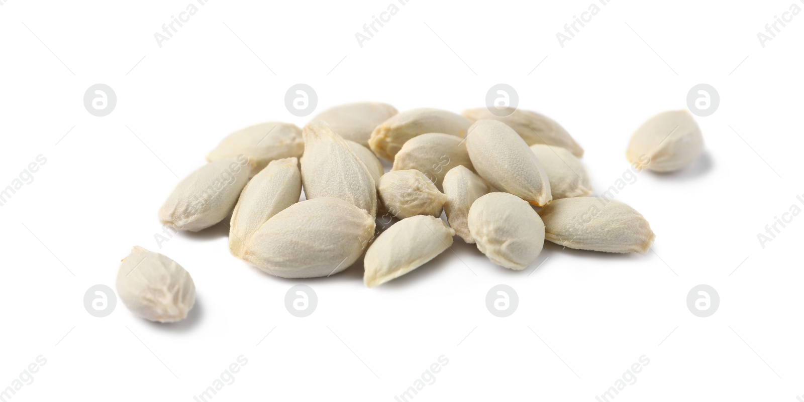 Photo of Many seeds of tangerine isolated on white