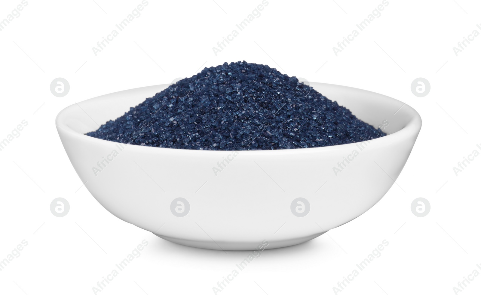 Photo of Bowl with blue food coloring isolated on white