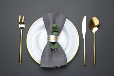 Photo of Elegant table setting on black background, flat lay