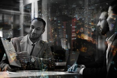 Image of Double exposure of business team in office and cityscape
