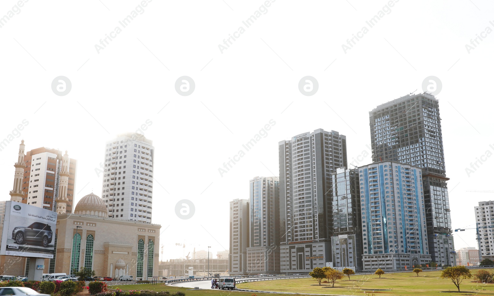 Photo of DUBAI, UNITED ARAB EMIRATES - NOVEMBER 06, 2018: Cityscape with modern buildings and mosque