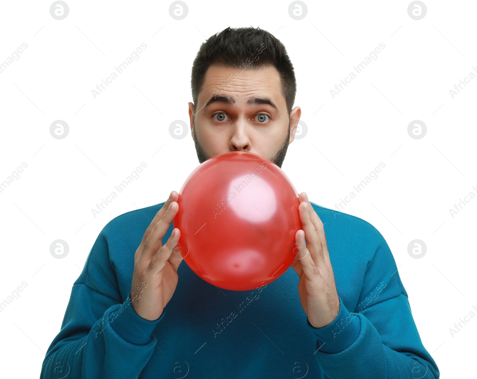 Photo of Man inflating bright balloon on white background