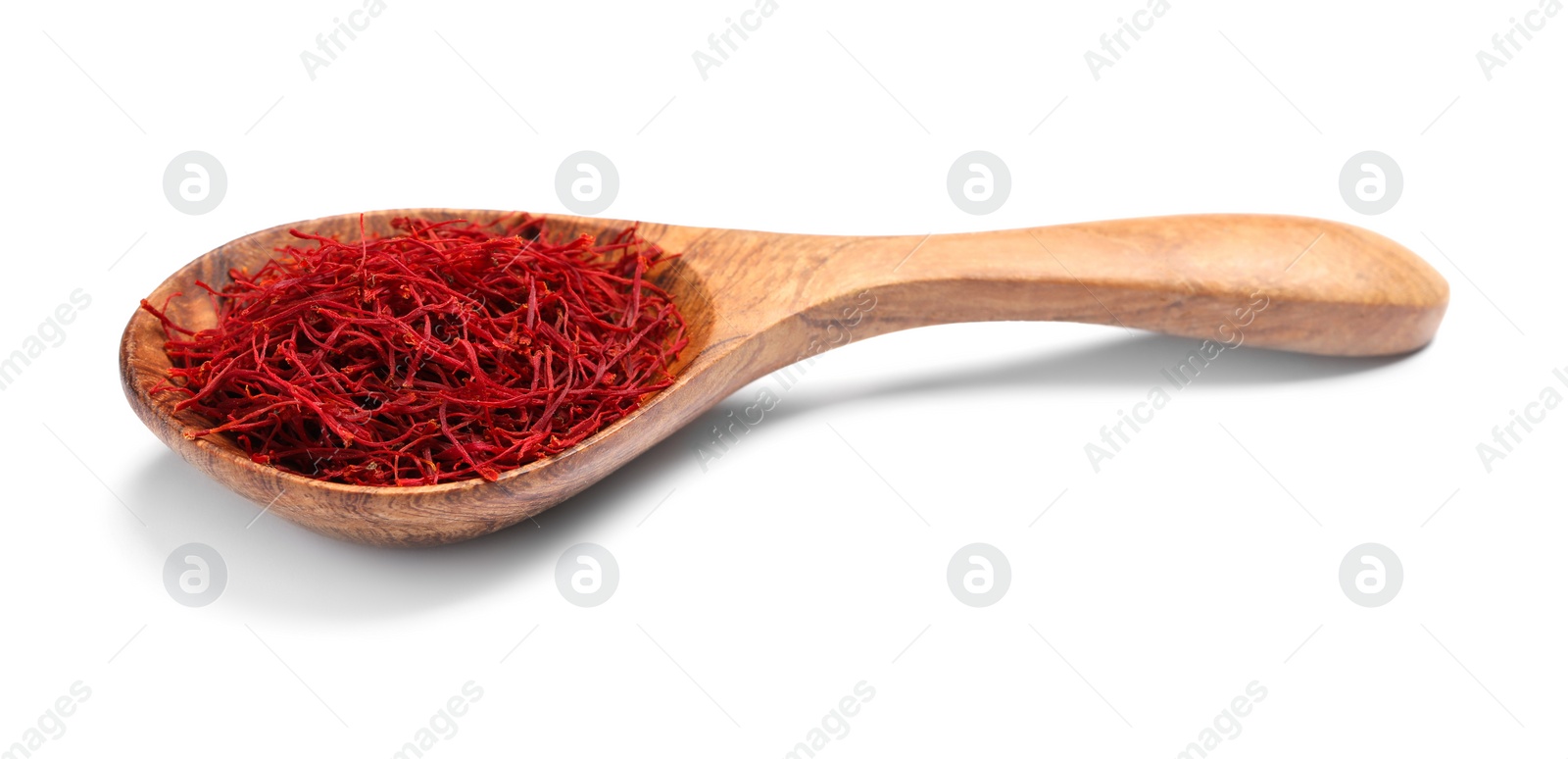 Photo of Aromatic saffron in spoon isolated on white