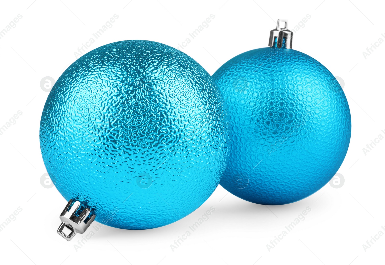 Photo of Beautiful light blue Christmas balls isolated on white