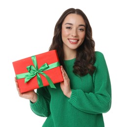 Photo of Beautiful young woman with Christmas gift isolated on white