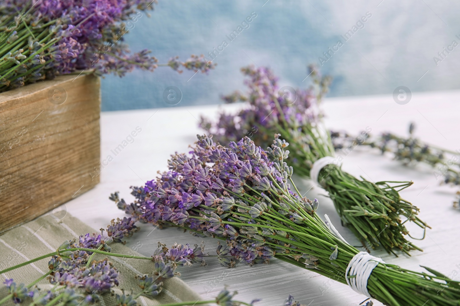 Photo of Composition with blooming lavender flowers on table