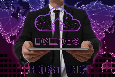 Image of Web hosting. Man holding tablet against world map, closeup. Digital cloud with arrow and icons over gadget