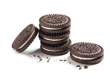 Photo of Tasty chocolate cookies and crumbs on white background