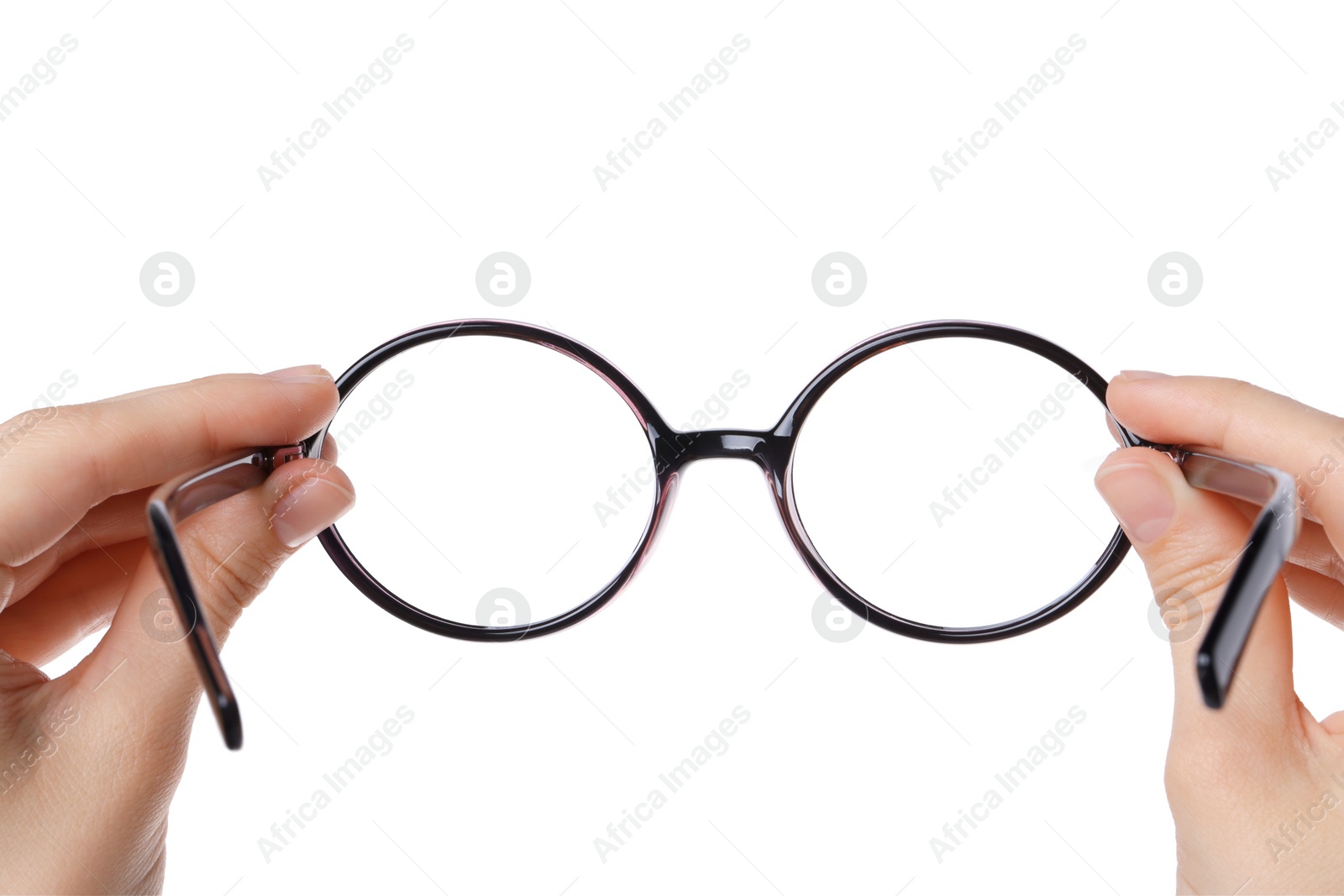 Photo of Woman holding stylish glasses with plastic frame on white background, closeup