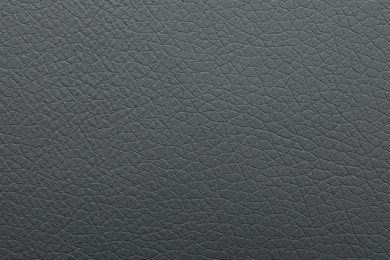 Photo of Texture of grey leather as background, closeup