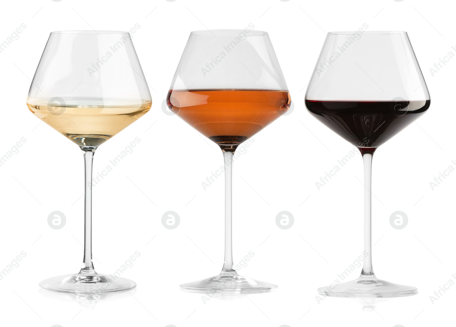 Image of Glasses of white, rose and red wine isolated on white