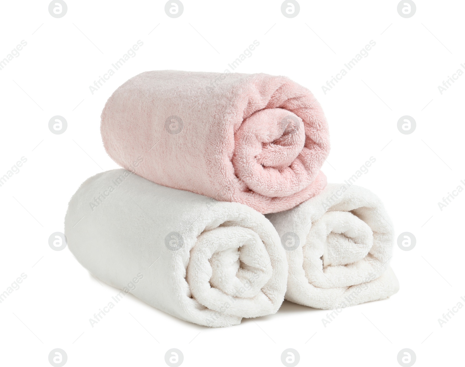 Photo of Rolled soft terry towels on white background