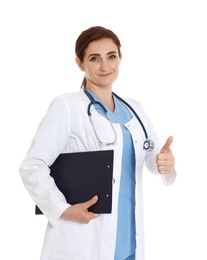 Photo of Portrait of female doctor with clipboard showing thumb up isolated on white. Medical staff