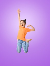 Image of Happy cute girl jumping on color gradient background