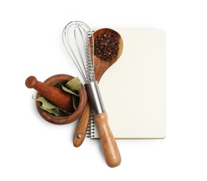 Photo of Blank recipe book, spices and kitchen utensils on white background, top view. Space for text