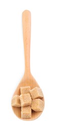 Photo of Brown sugar cubes in wooden spoon isolated on white, top view