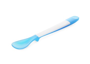 Plastic spoon isolated on white. Serving baby food