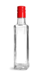 Glass bottle with vinegar on white background