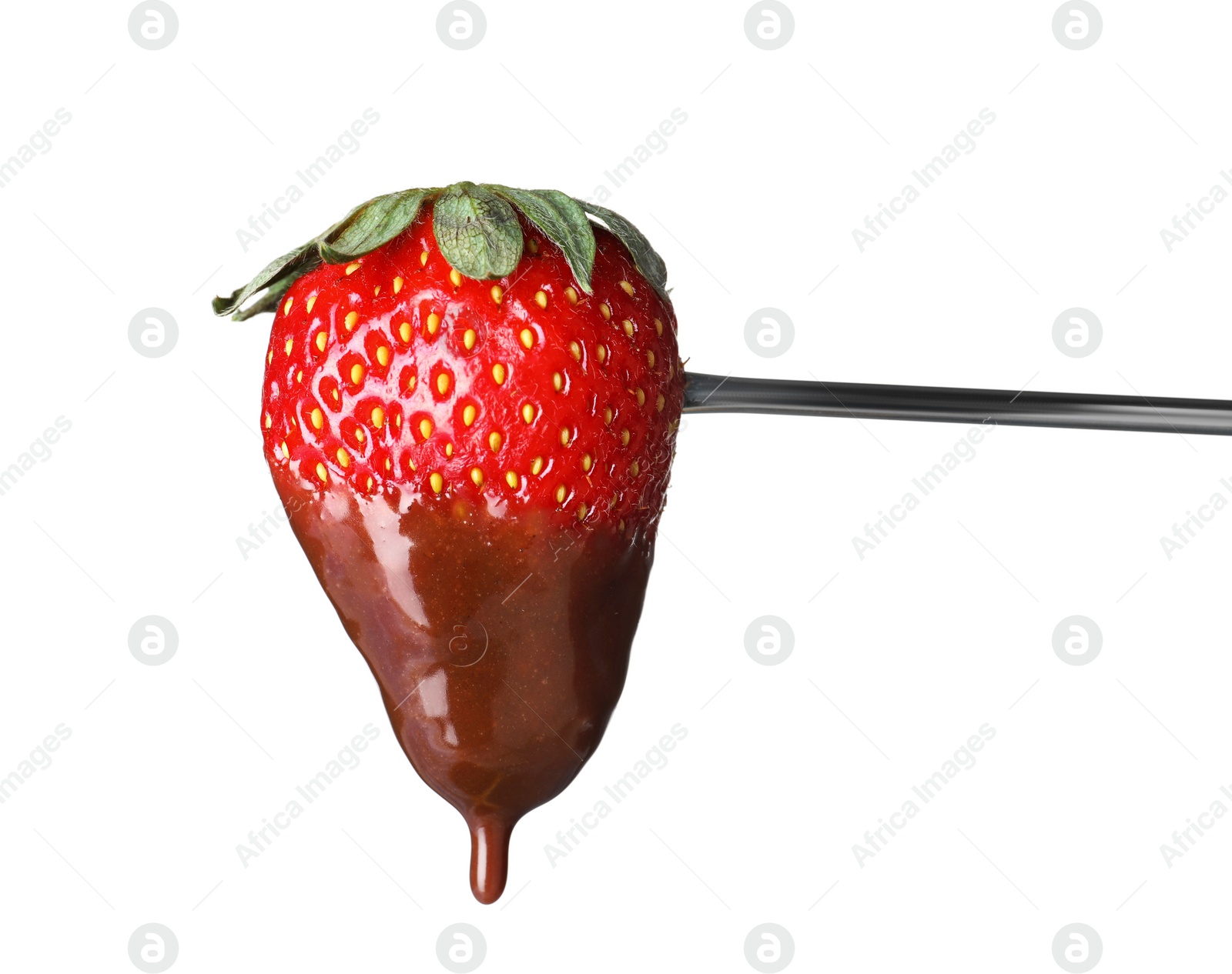 Photo of Strawberry with chocolate on fondue fork against white background