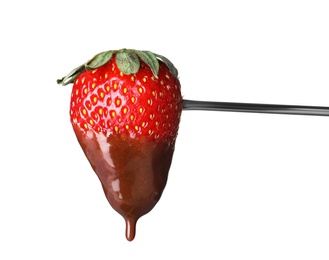 Strawberry with chocolate on fondue fork against white background