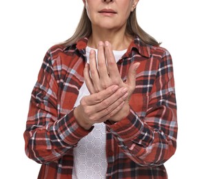 Photo of Arthritis symptoms. Woman suffering from pain in hand on white background, closeup