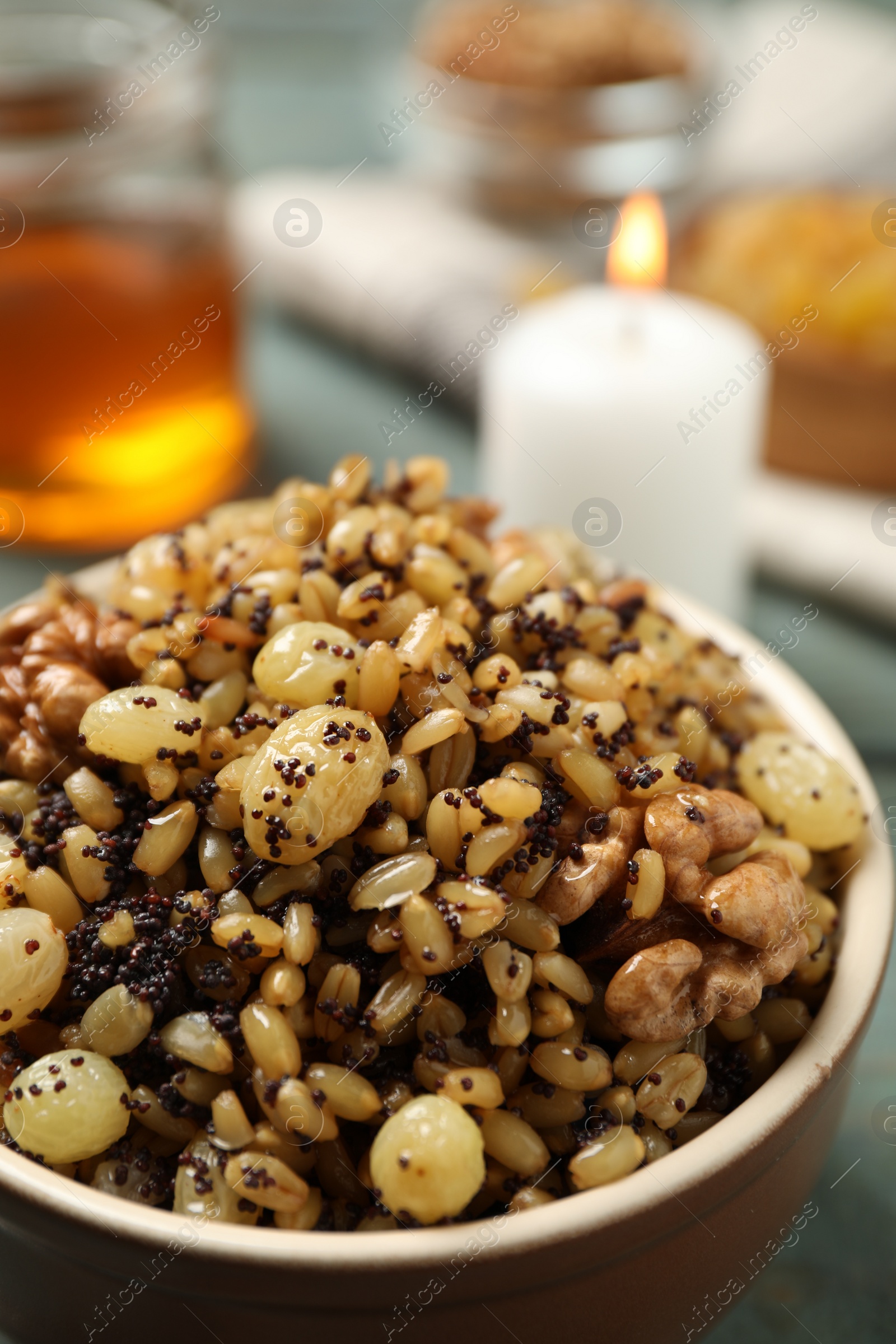 Photo of Traditional Christmas slavic dish kutia in bowl, closeup