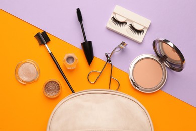 Image of Flat lay composition with eyelash curler, makeup products and accessories on color background