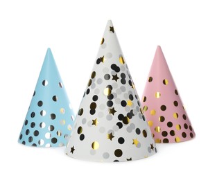 Bright party hats on white background. Festive accessory