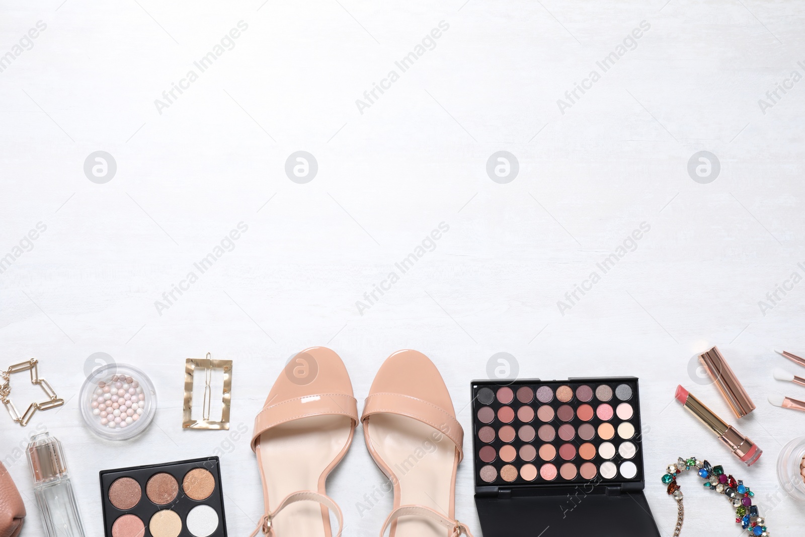 Photo of Cosmetic products and accessories on white background, flat lay. Space for text